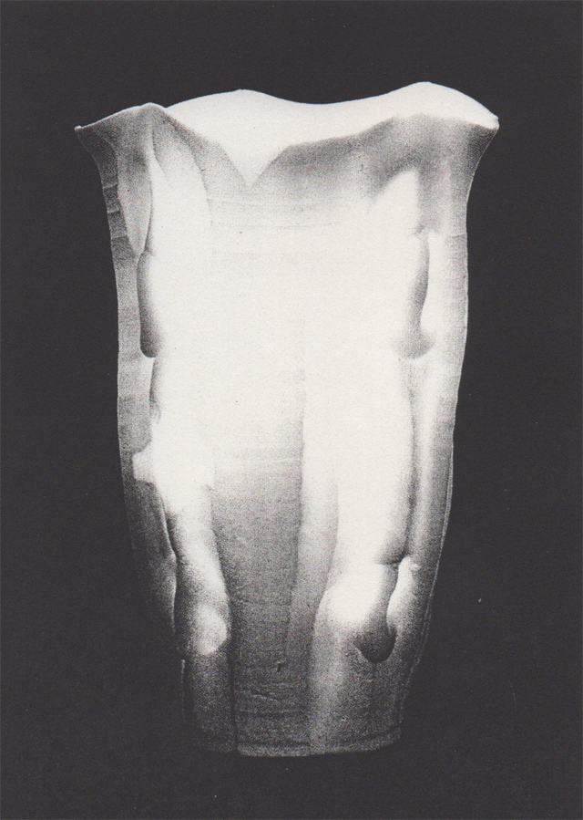 Vase, Rudolf Staffel, 1989. Porcelain, 8 inches high.  In the translucent porcelains called "light gatherers," Staffel takes the vessel form beyond function and decoration and imbues it with an expressive, ethereal quality.  Image courtesy Helen Drutt Gallery, New York